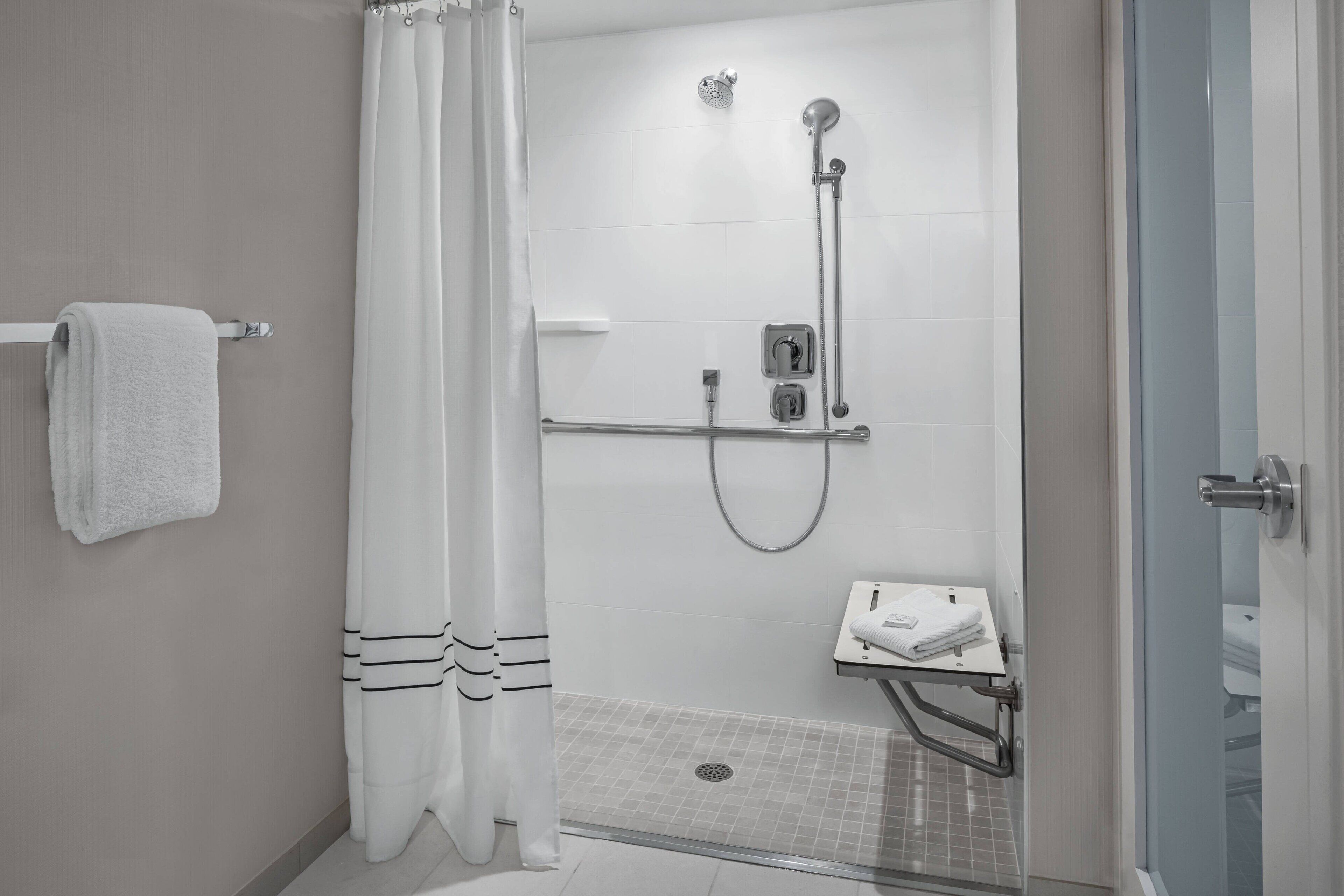combined shower/bathtub, eco-friendly toiletries, hair dryer, towels