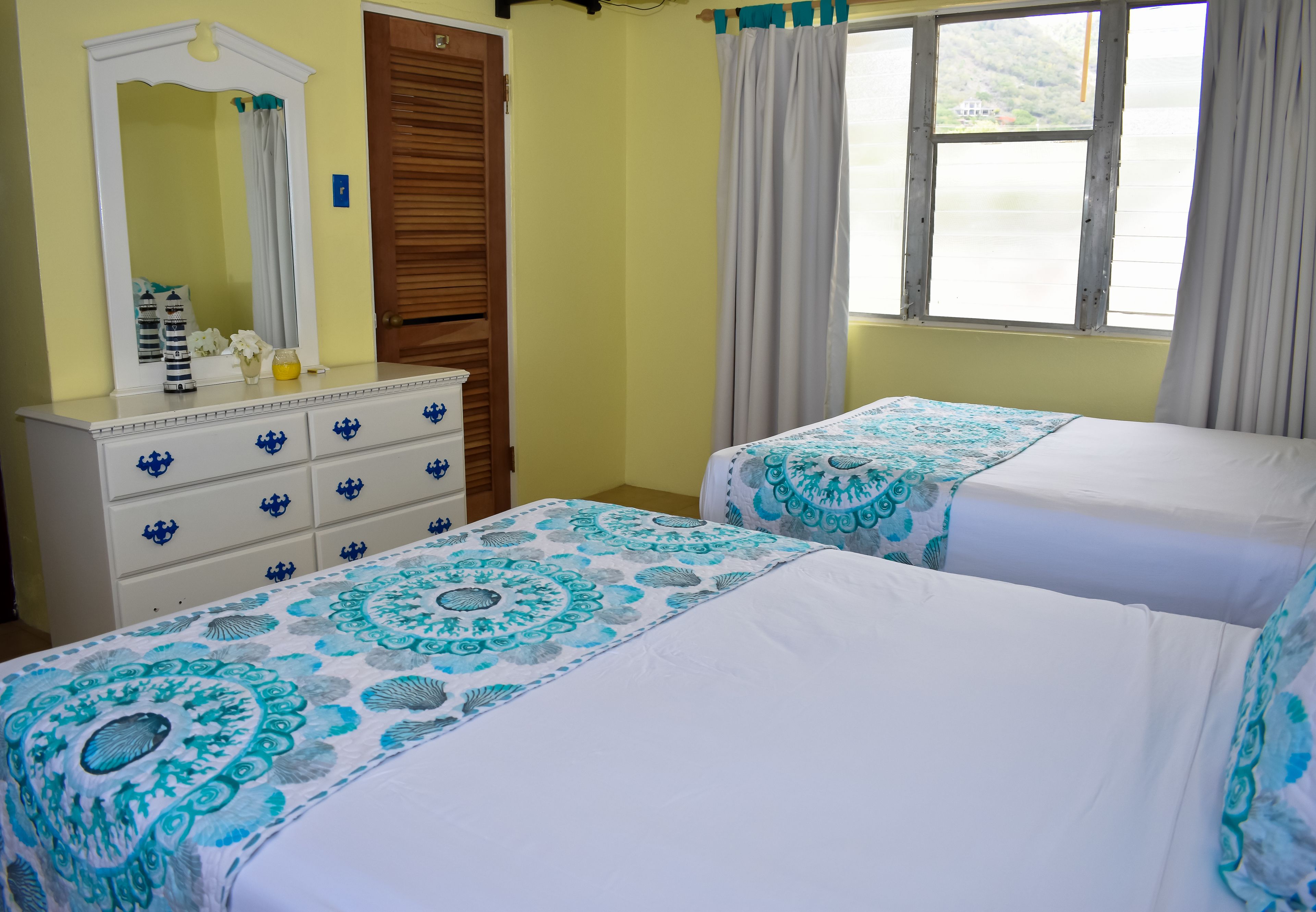 standard room, 2 double beds, beachside | individually decorated, individually furnished, iron/ironing board