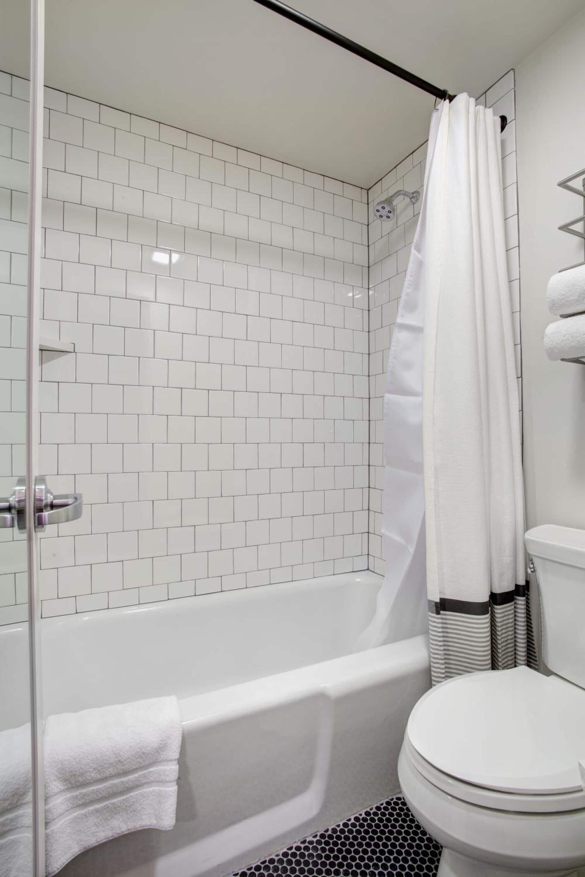 combined shower/bathtub, free toiletries, hair dryer, bathrobes