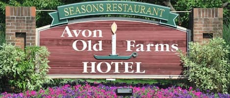 A sign for Seasons Restaurant at Avon Old Farms Hotel.