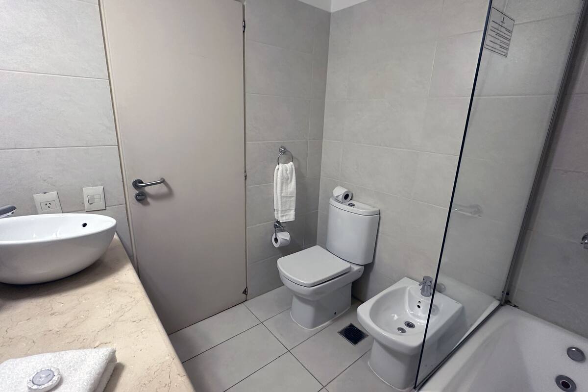 standard triple room | bathroom | bathtub, deep-soaking bathtub, eco-friendly toiletries, hair dryer