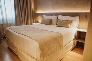 Ropa de cama de alta calidad y minibar 