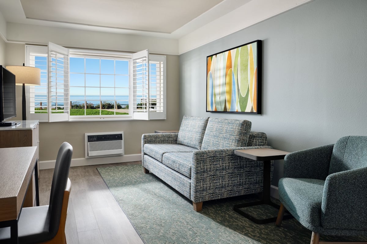 Suite, 1 Queen Bed, Kitchen | Desk, blackout drapes, iron/ironing board, cribs/infant beds