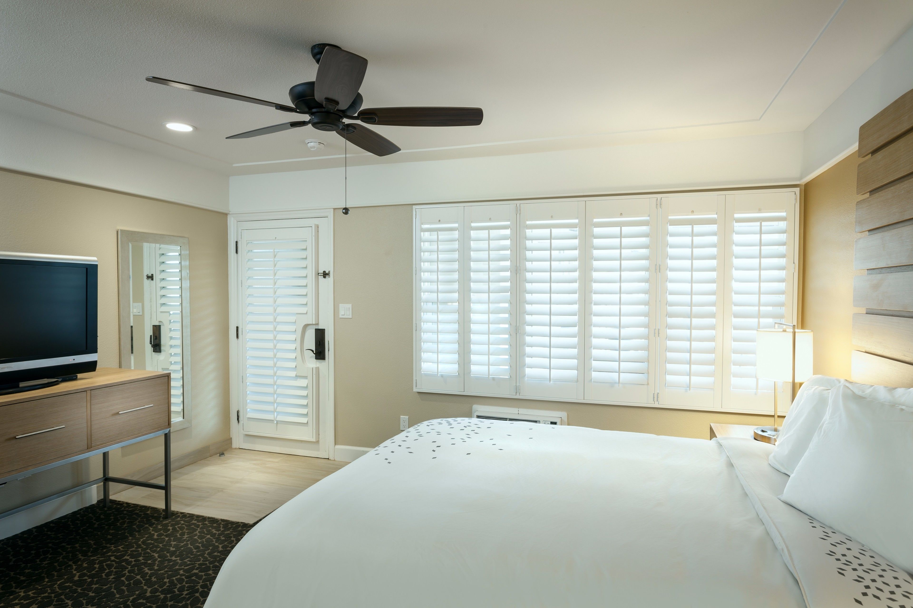 Desk, blackout drapes, iron/ironing board, cribs/infant beds