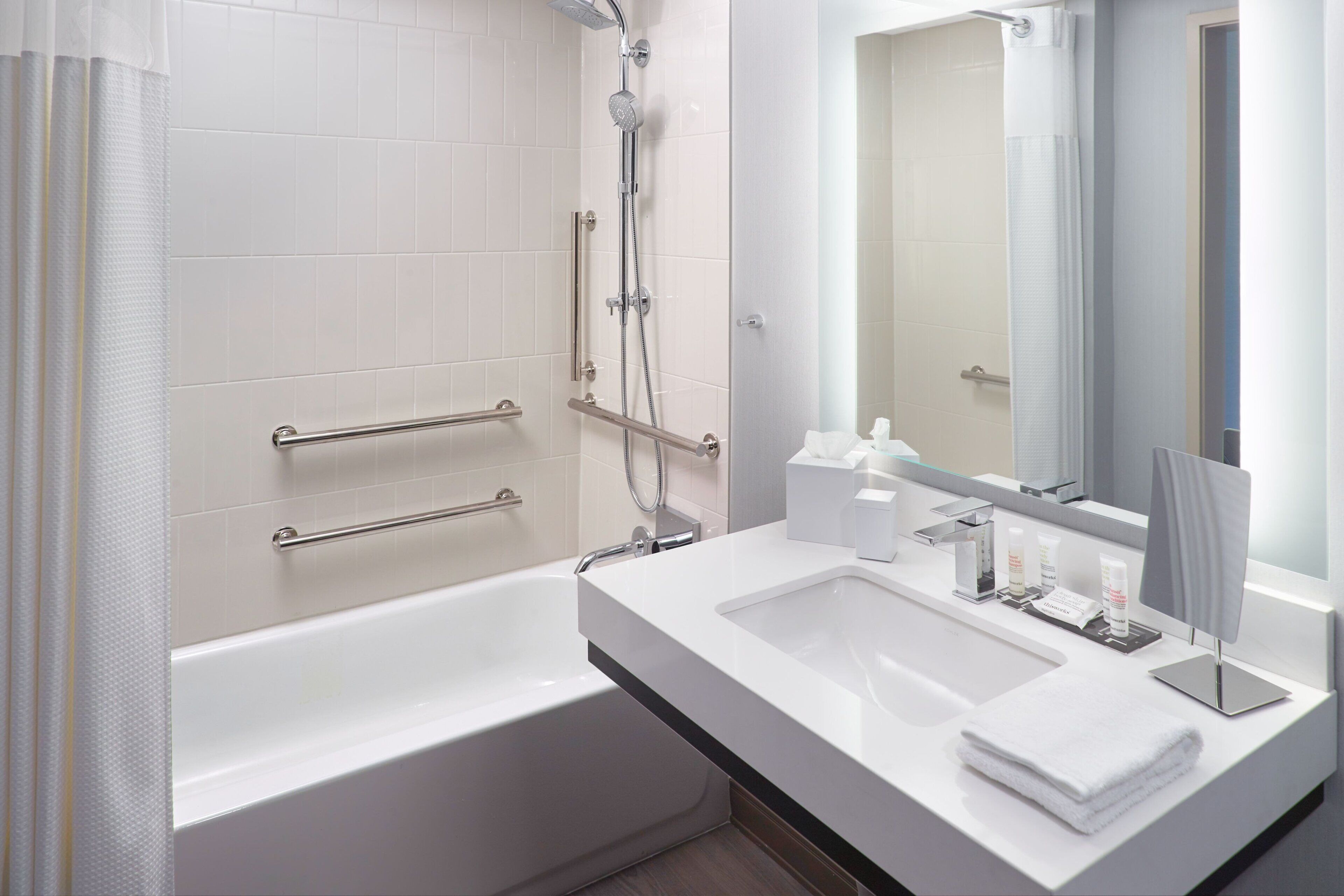 combined shower/bathtub, eco-friendly toiletries, hair dryer, towels