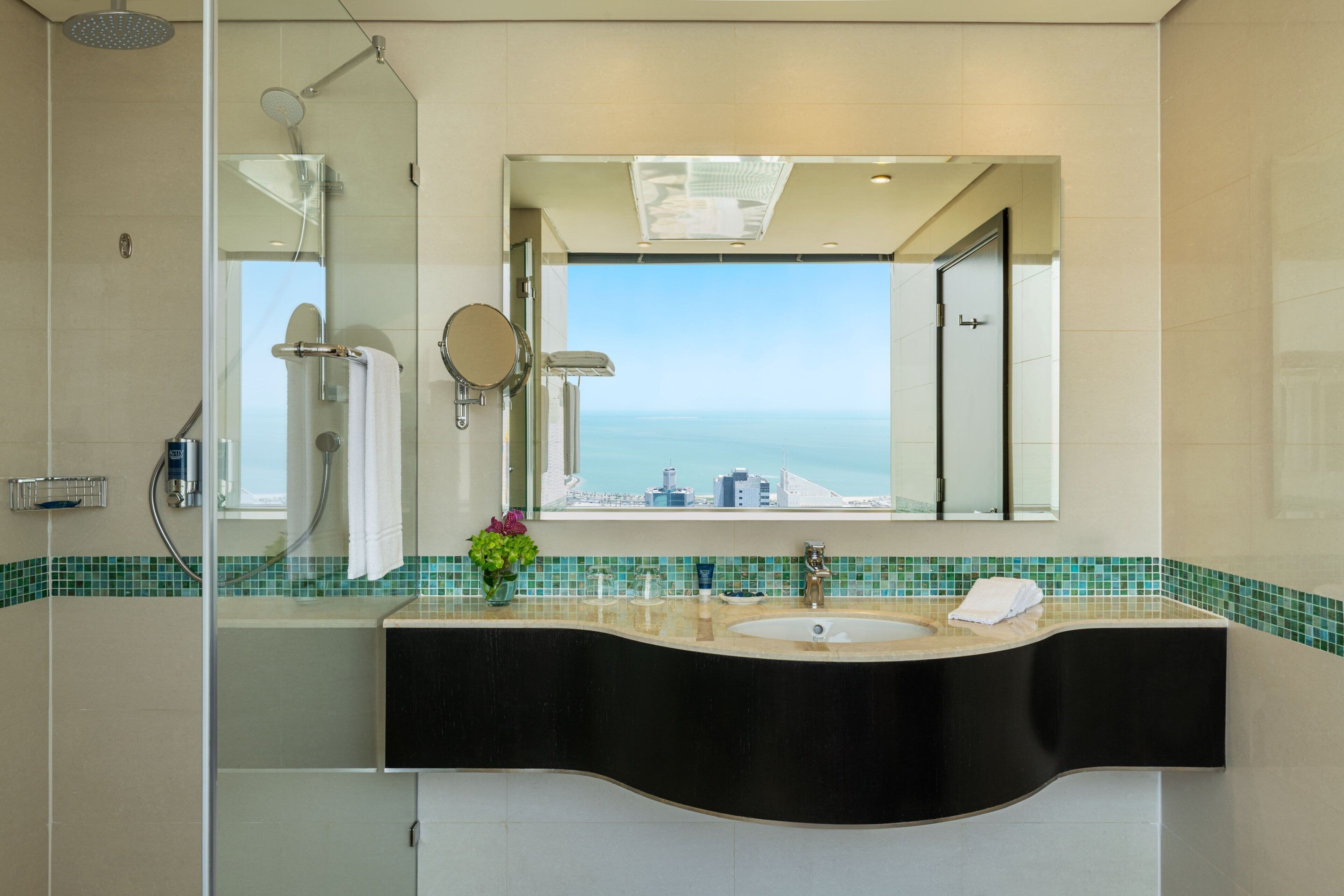 business suite, 1 king bed (view) | bathroom | shower, rainfall showerhead, eco-friendly toiletries, hair dryer