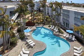 Outdoor pool, open 7 AM to 11:00 PM, pool umbrellas, sun loungers