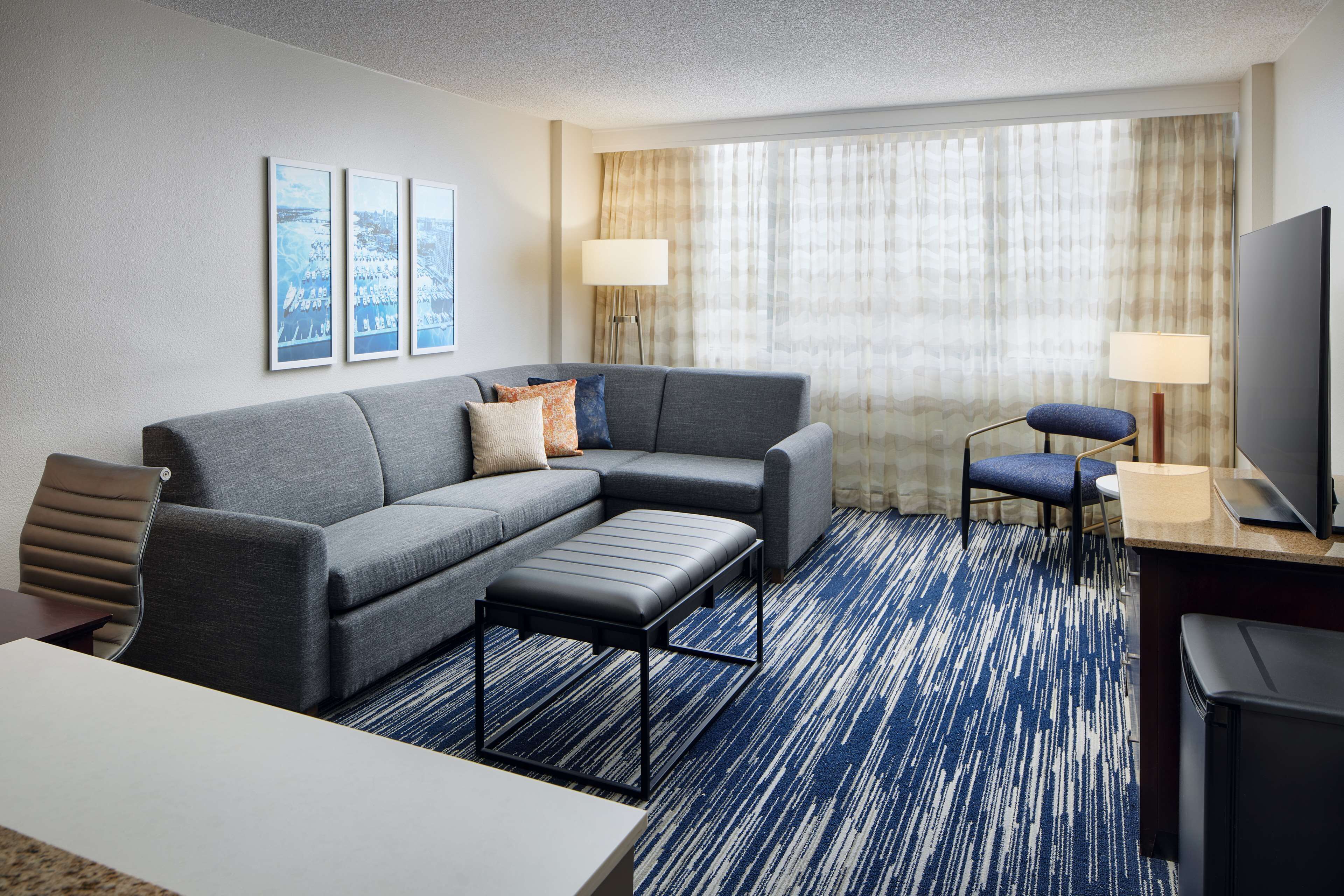 premium suite, 1 queen bed, accessible, bathtub (mobility & hearing) | living area | 37-inch lcd tv with digital channels, tv, pay films