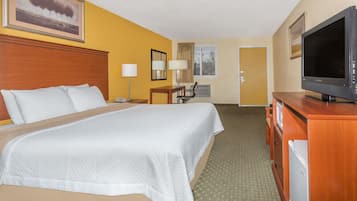 Desk, laptop workspace, blackout drapes, rollaway beds