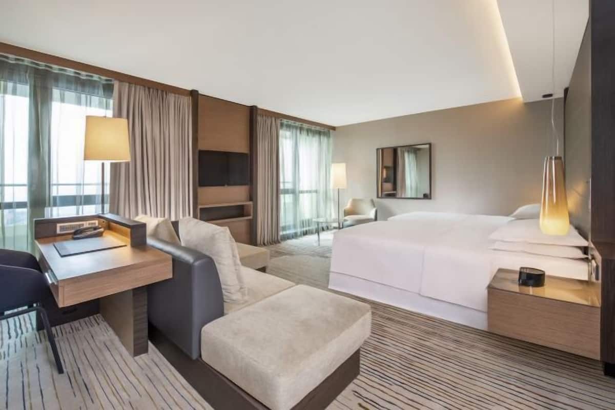 Ropa de cama de alta calidad, minibar, caja fuerte y escritorio