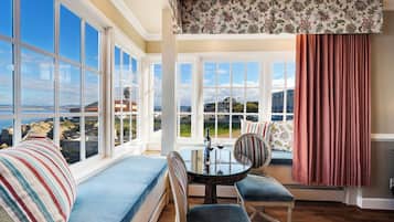 Deluxe Room, 1 King Bed, Fireplace, Corner (Ocean) | Premium bedding, in-room safe, desk, iron/ironing board