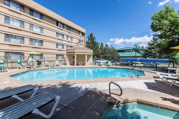 Outdoor pool, pool umbrellas, pool loungers
