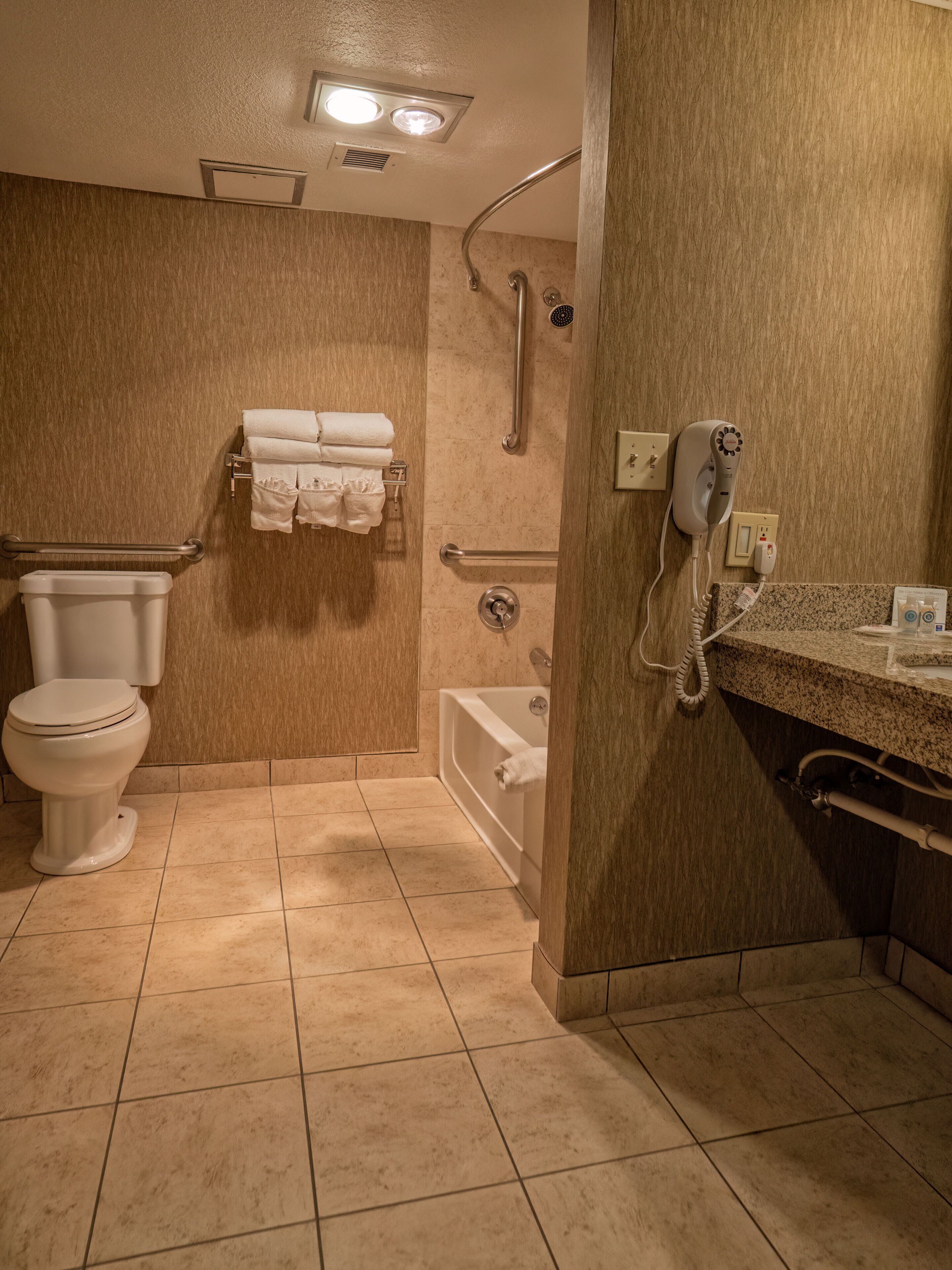 combined shower/bathtub, free toiletries, hair dryer, towels