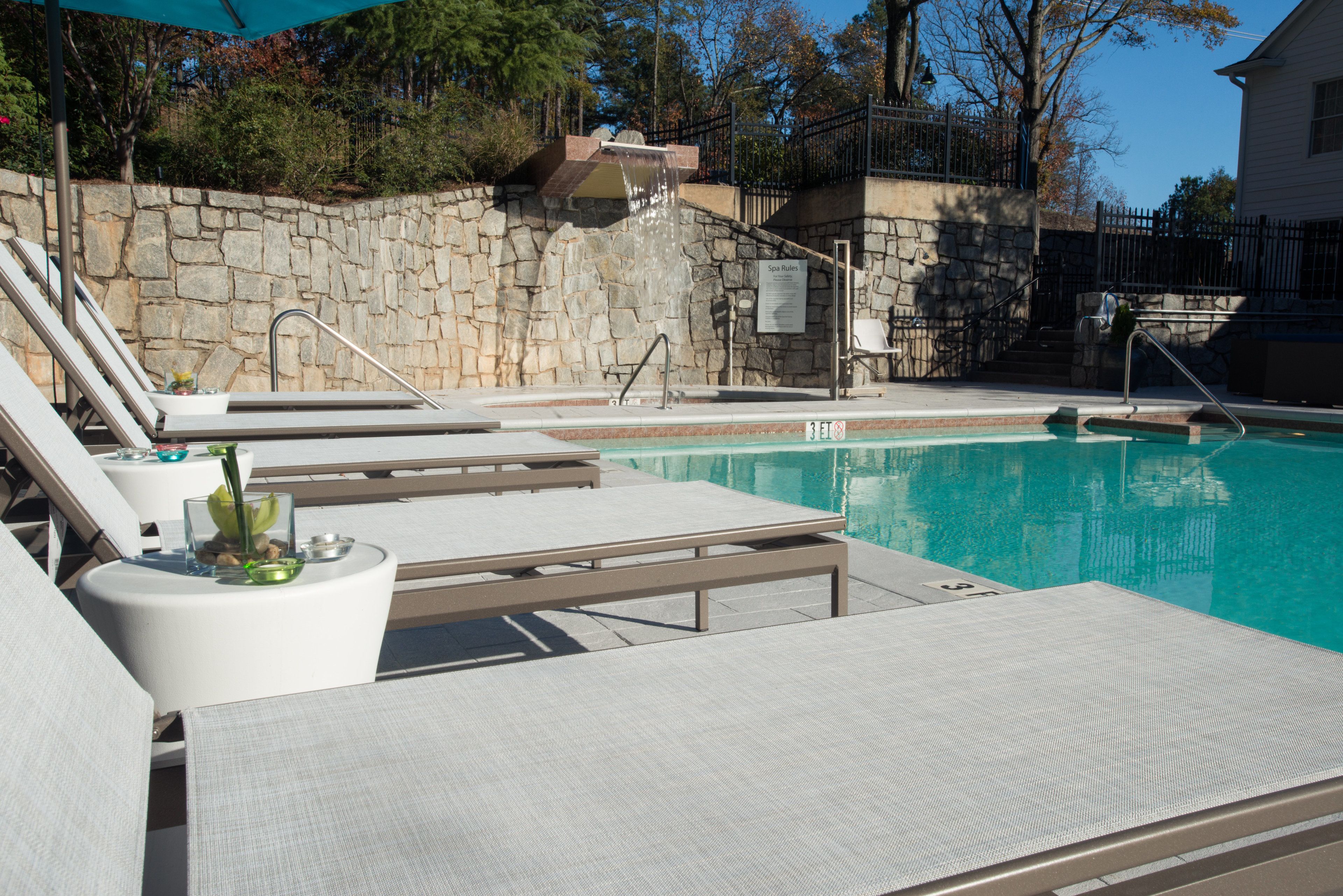 seasonal outdoor pool, open 8:00 am to 10 pm, pool umbrellas