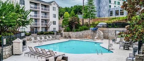 Seasonal outdoor pool, open 8:00 AM to 10 PM, pool umbrellas