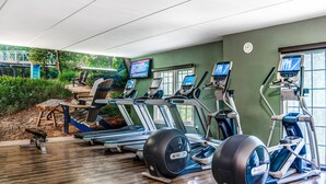A gym with treadmills, elliptical machines, and stationary bikes. - Hotel Indigo Atlanta-Vinings Ballpark Area by IHG (Atlanta)