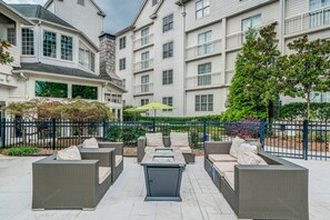 Seasonal outdoor pool, open 8:00 AM to 10 PM, pool umbrellas