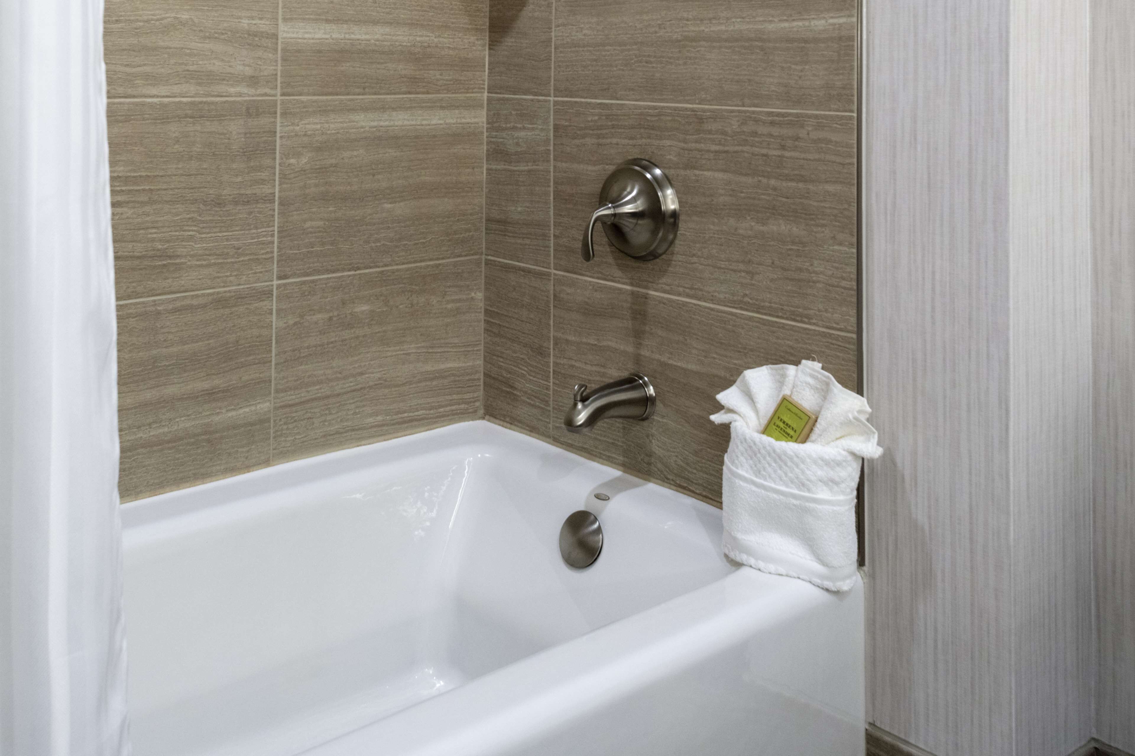 eco-friendly toiletries, hair dryer, towels, soap