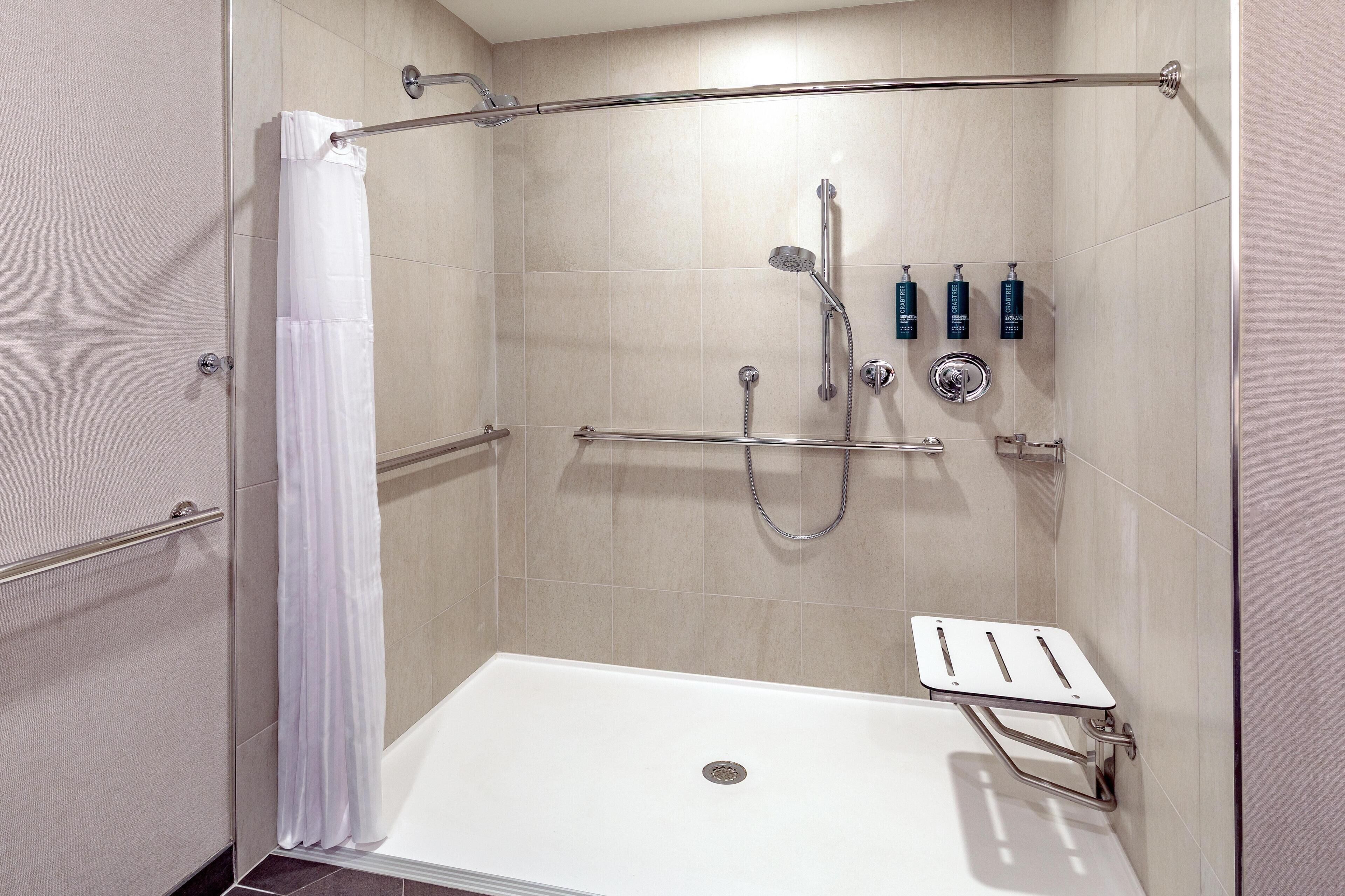A walk-in shower with a glass door, a showerhead, a handheld shower, a handheld showerhead, a handheld showerhead, a handheld showerhead, a handheld showerhead, a handheld showerhead, a handheld showerhead, a handheld showerhead, a handheld showerhead, a handheld showerhead, a handheld showerhead, a handheld showerhead, a handheld showerhead, a handheld showerhead, a handheld showerhead, a handheld showerhead, a handheld showerhead, a handheld showerhead, a handheld showerhead, a handheld showerhead, a handheld showerhead, a handheld showerhead, a handheld showerhead, a handheld showerhead, a handheld showerhead, a handheld showerhead, a handheld showerhead, a handheld showerhead, a handheld showerhead, a handheld showerhead, a handheld showerhead, a handheld showerhead, a handheld showerhead, a handheld showerhead, a handheld showerhead, a handheld showerhead, a handheld showerhead,