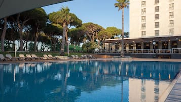 Seasonal outdoor pool, pool loungers