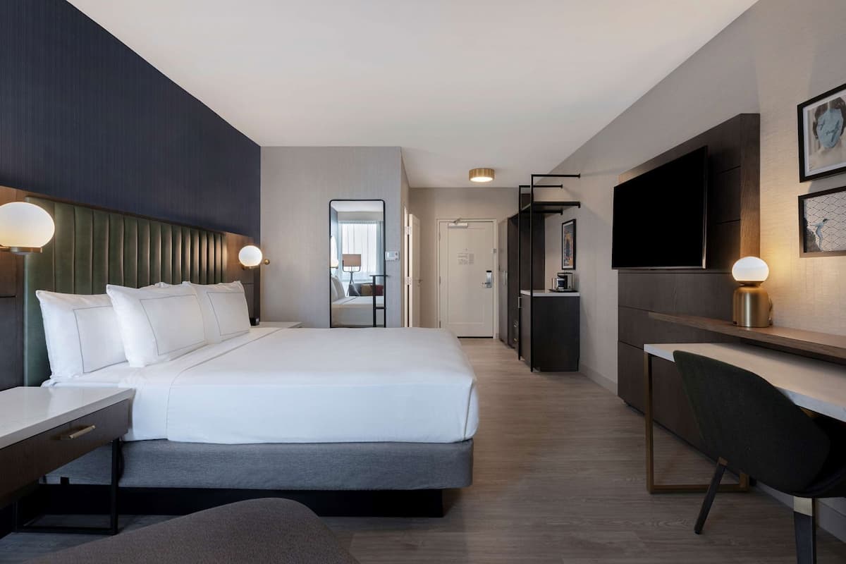 Down comforters, pillowtop beds, in-room safe, desk