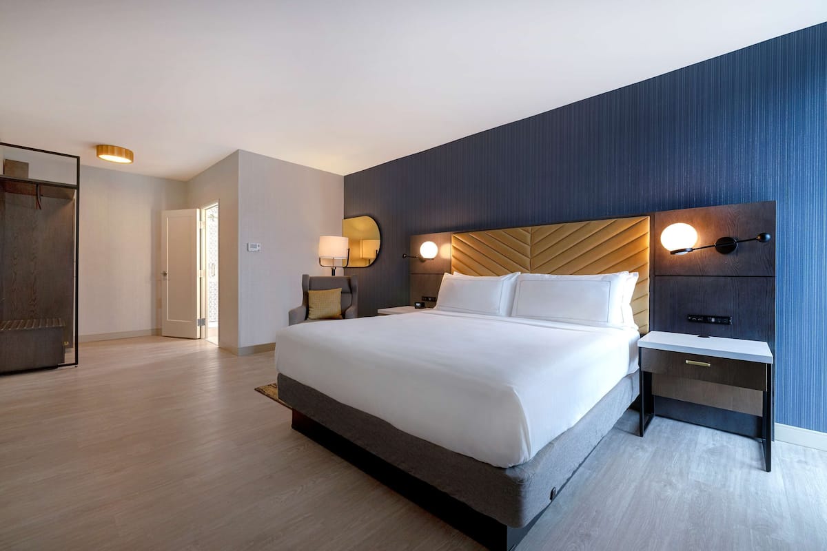 Down comforters, pillowtop beds, in-room safe, desk