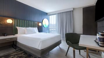 Down duvets, pillow-top beds, in-room safe, desk