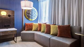 Down duvets, pillow-top beds, in-room safe, desk