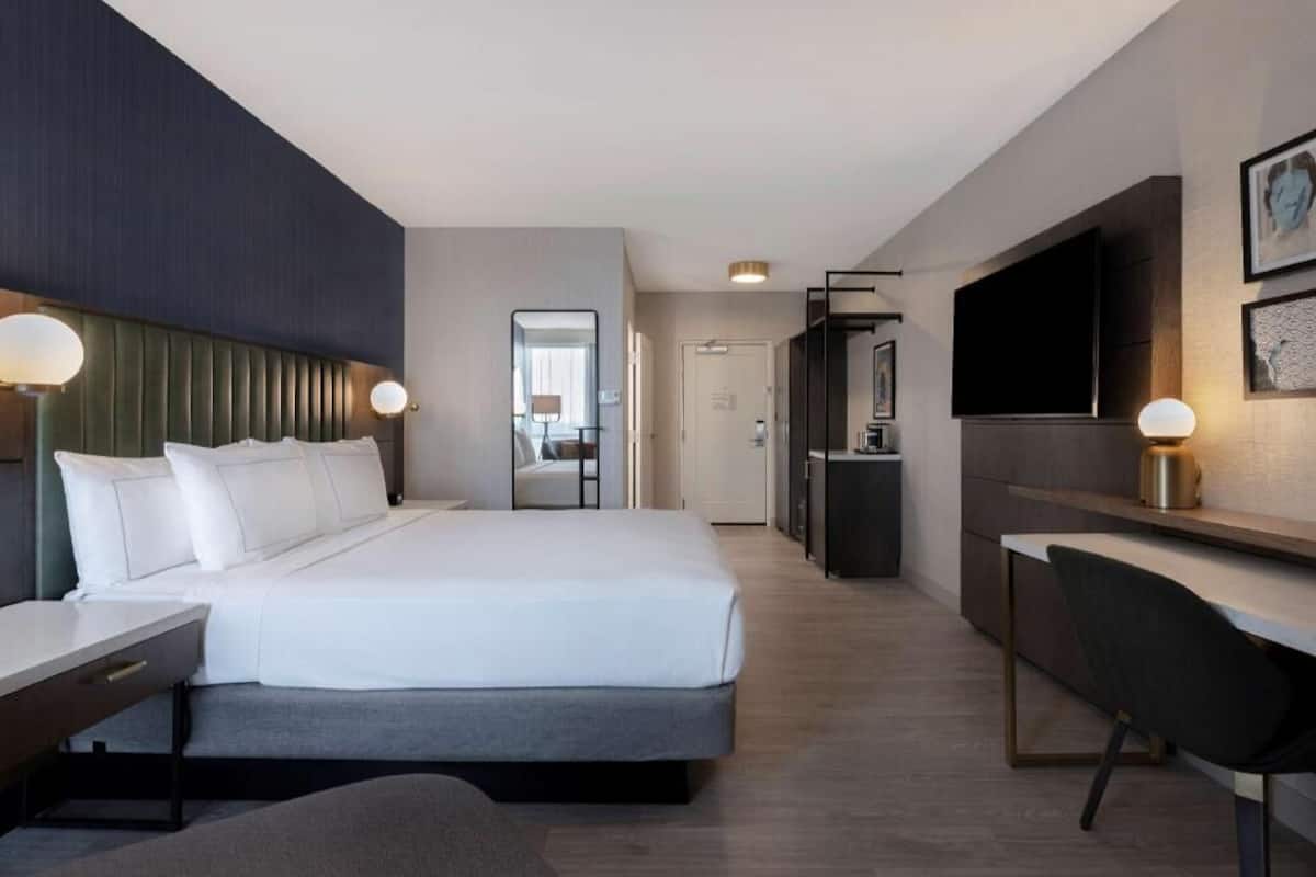 Down comforters, pillowtop beds, in-room safe, desk
