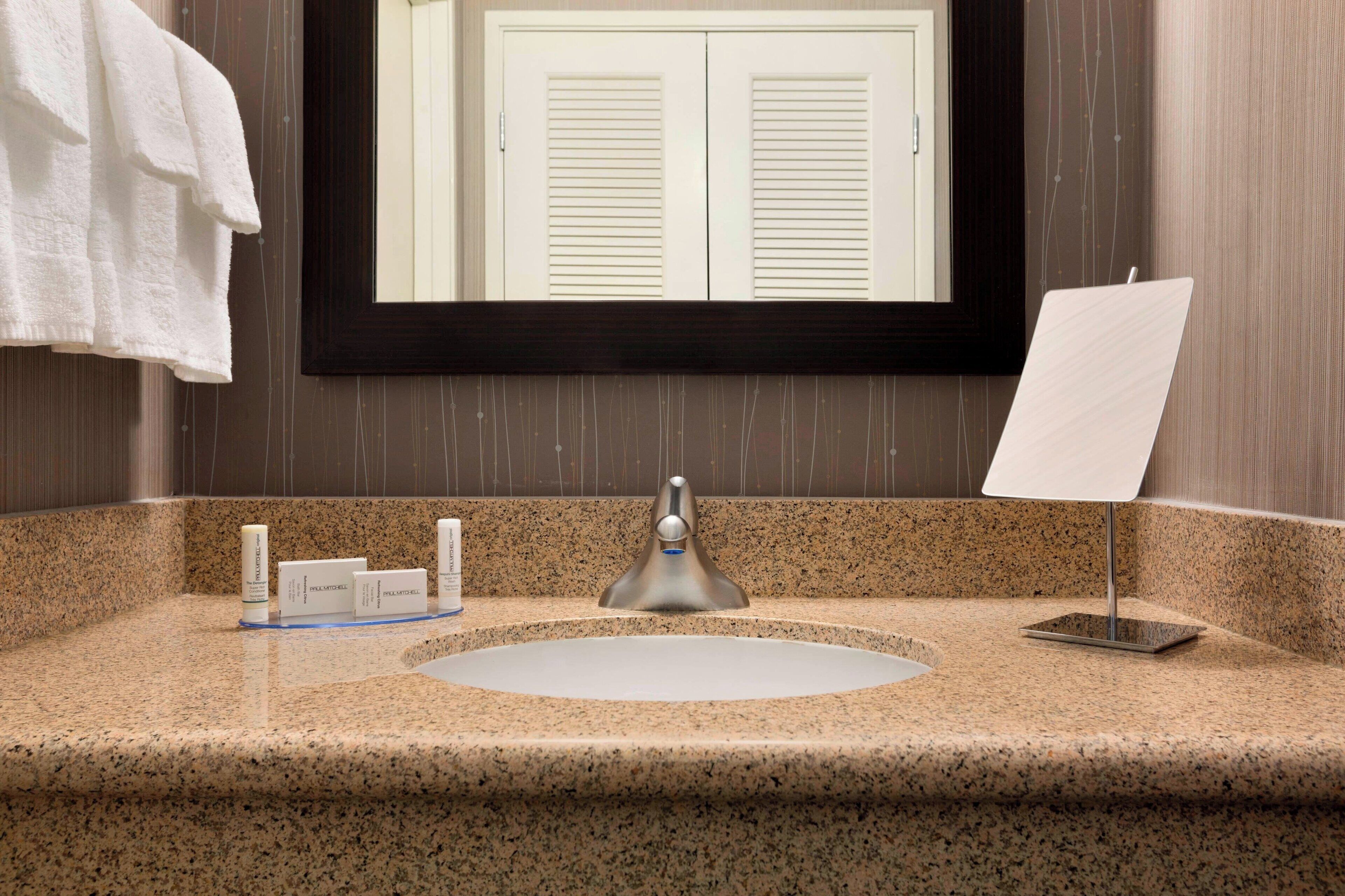 combined shower/bathtub, eco-friendly toiletries, hair dryer, towels