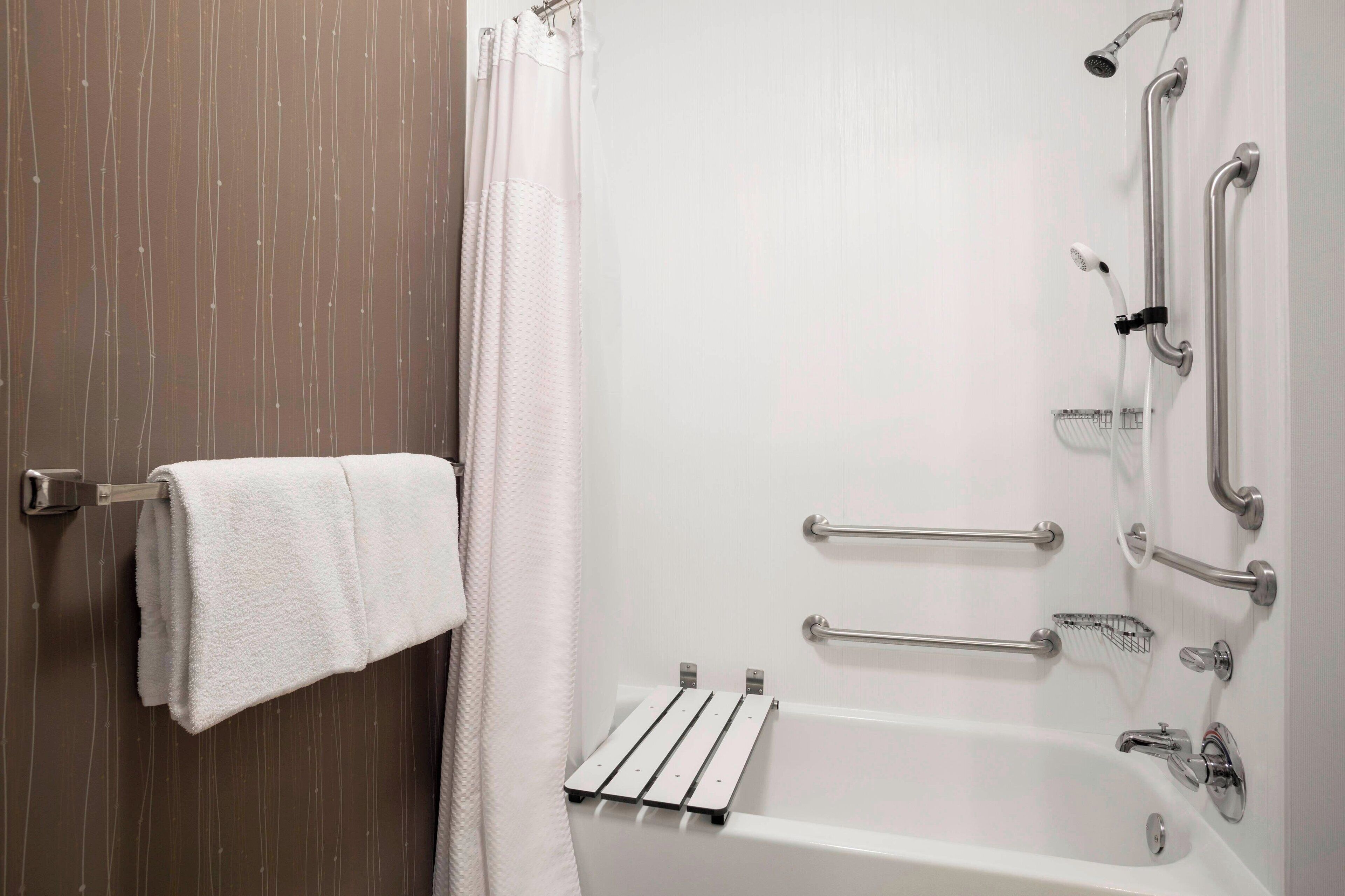 room, 2 queen beds, non smoking | bathroom | combined shower/bathtub, eco-friendly toiletries, hair dryer, towels