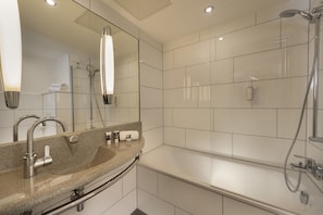 Combined shower/bathtub, eco-friendly toiletries, hair dryer, bathrobes