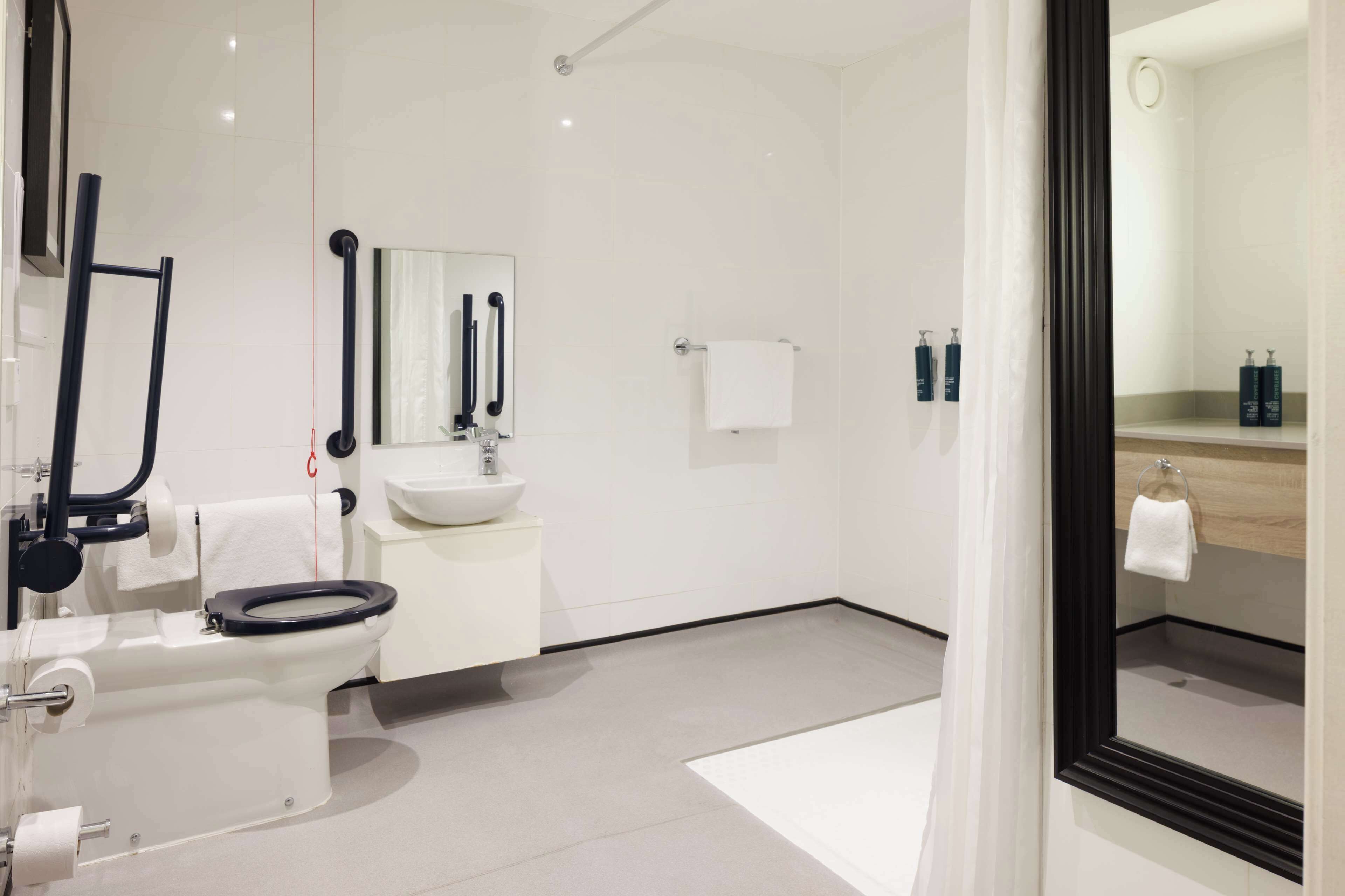 room, 2 queen beds, accessible | bathroom | combined shower/bathtub, free toiletries, hair dryer, towels