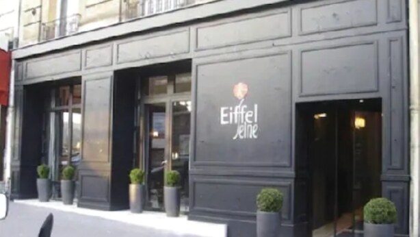 A building facade with the name "Eiffel Jeine" displayed prominently. - Hotel Eiffel Seine (Paris)