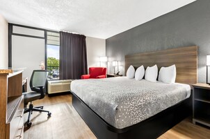 Room, 1 King Bed, Non Smoking | Desk, laptop workspace, blackout drapes, iron/ironing board