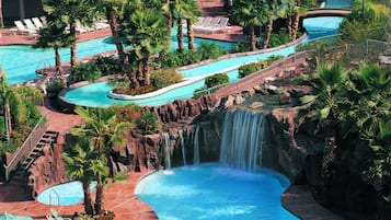7 outdoor pools, pool umbrellas, pool loungers
