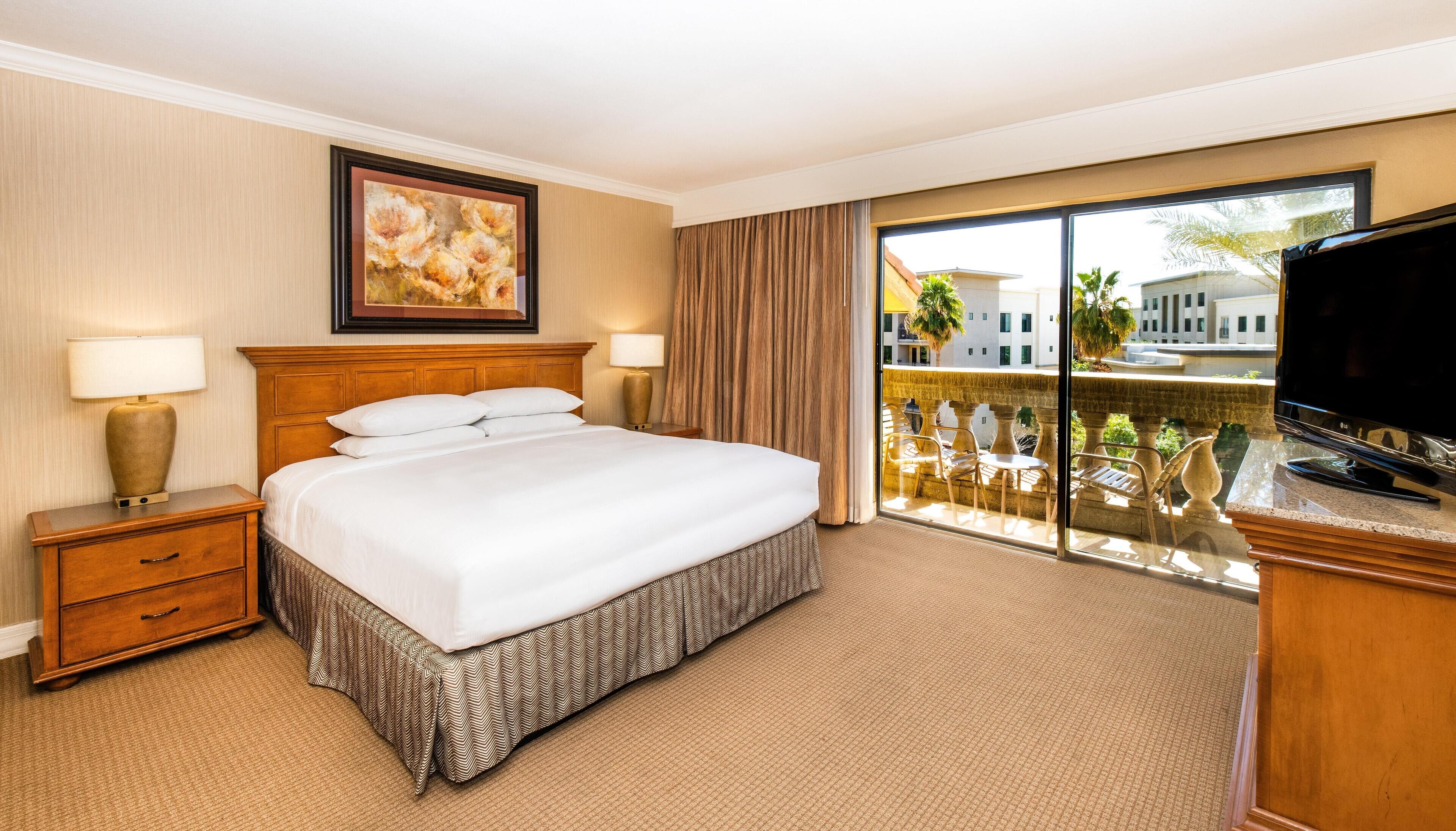 Premium bedding, down comforters, pillowtop beds, in-room safe