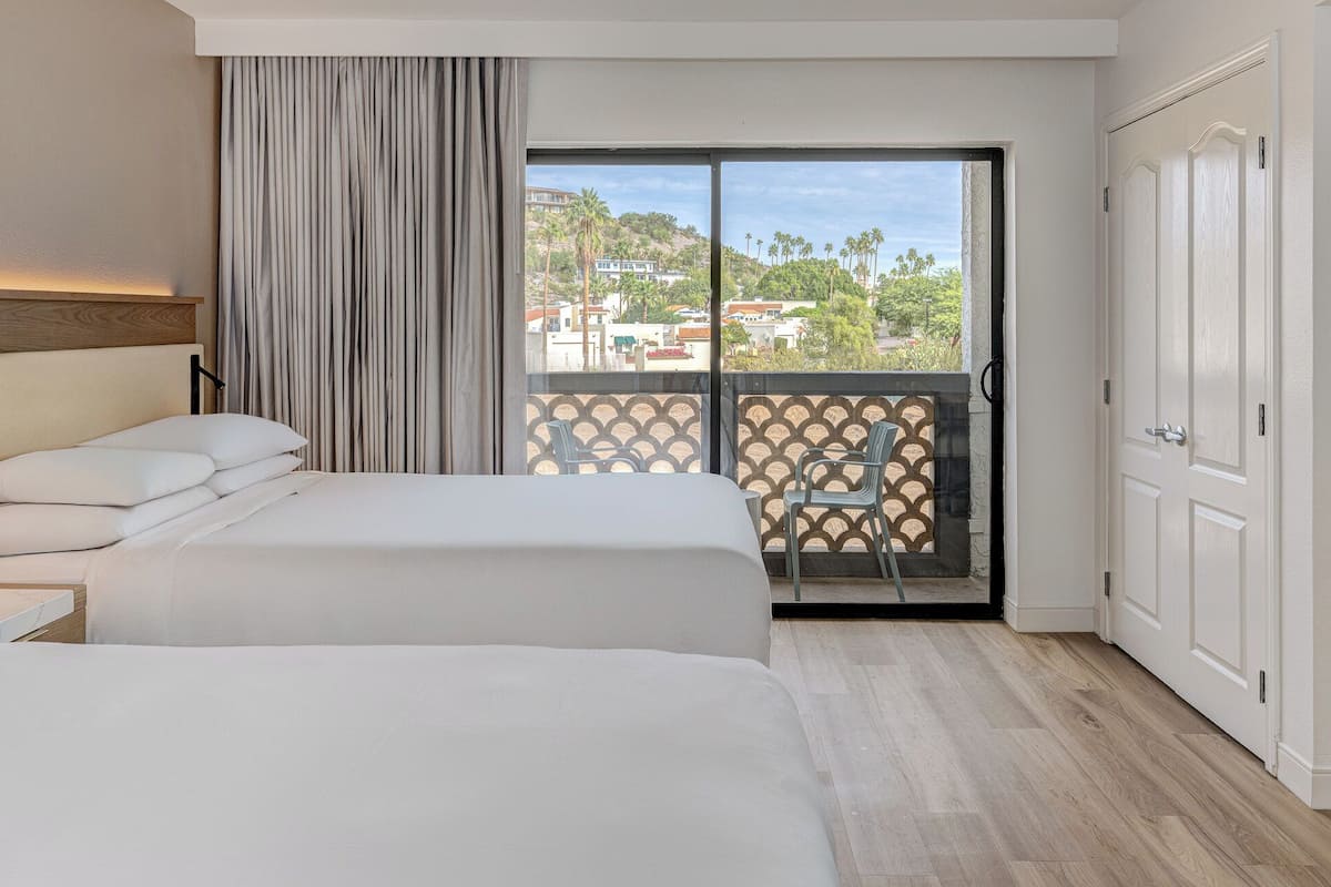 Premium bedding, down comforters, pillowtop beds, in-room safe