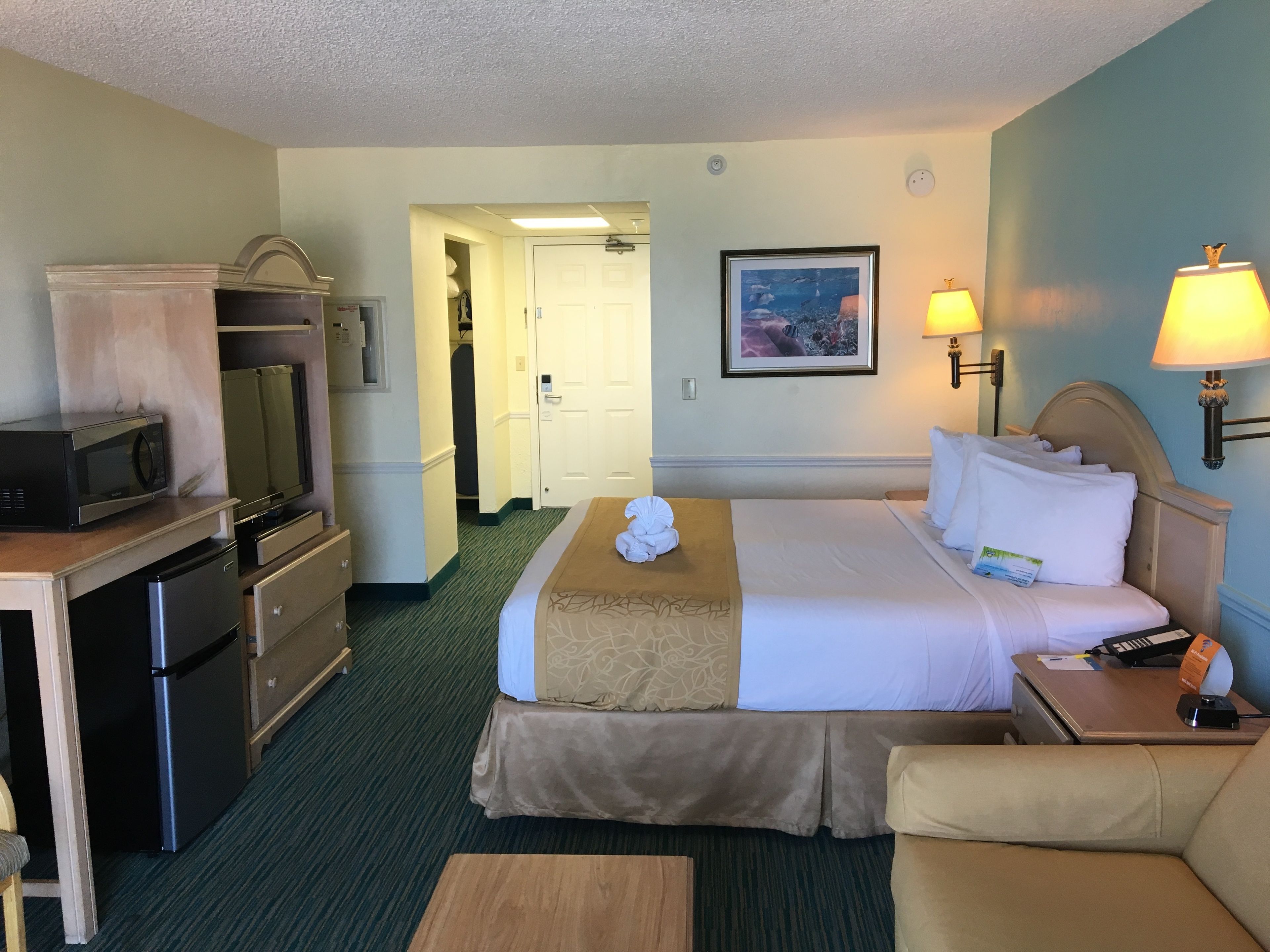 room, 1 king bed, non smoking, oceanfront | premium bedding, in-room safe, desk, iron/ironing board