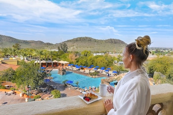 7 outdoor pools, cabanas (surcharge), pool umbrellas at Hilton Phoenix Tapatio Cliffs Resort