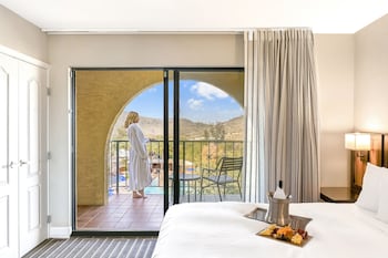7 outdoor pools, cabanas (surcharge), pool umbrellas at Hilton Phoenix Tapatio Cliffs Resort