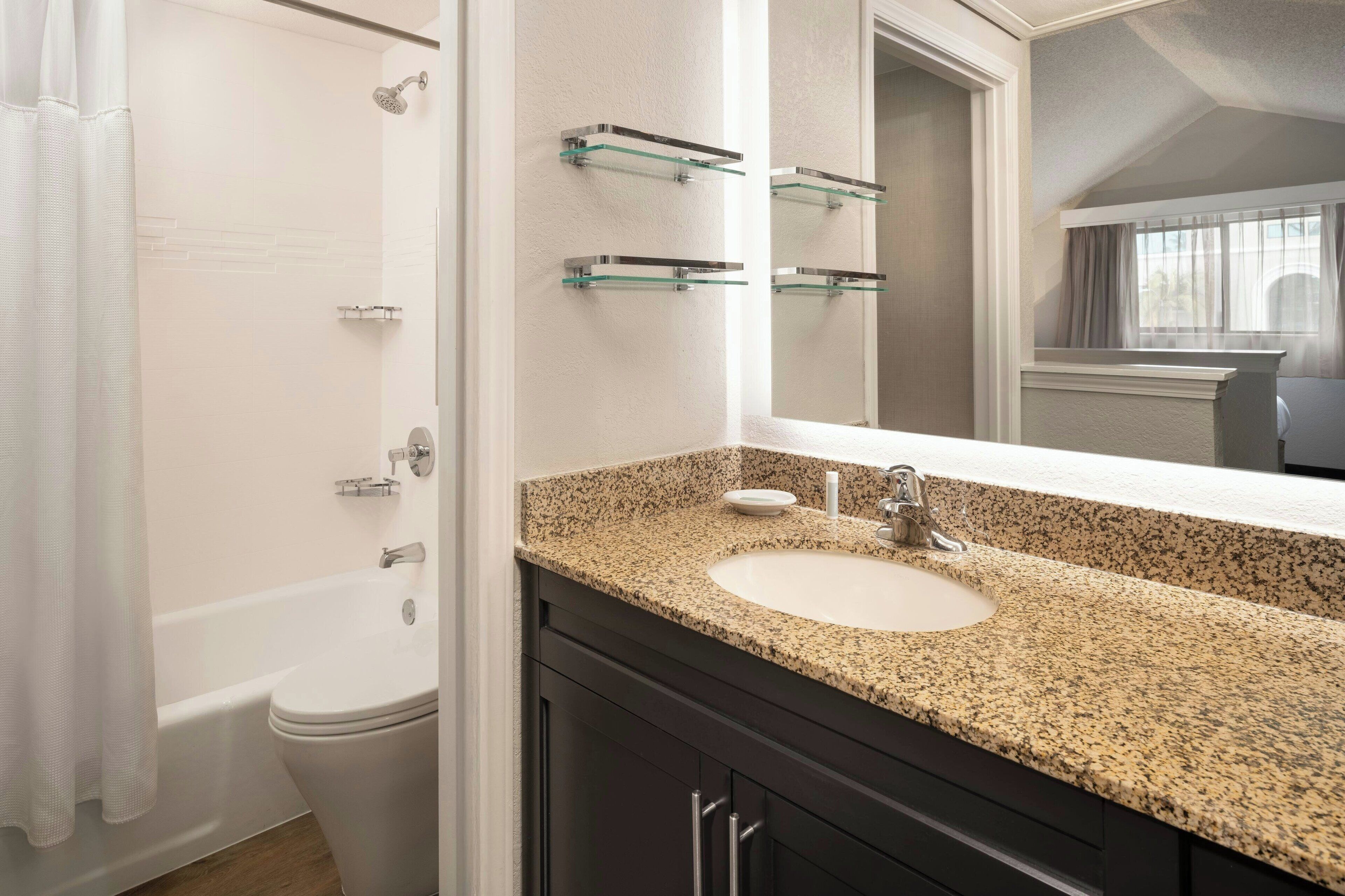 suite, 2 bedrooms, non smoking | bathroom | combined shower/bathtub, free toiletries, hair dryer, towels