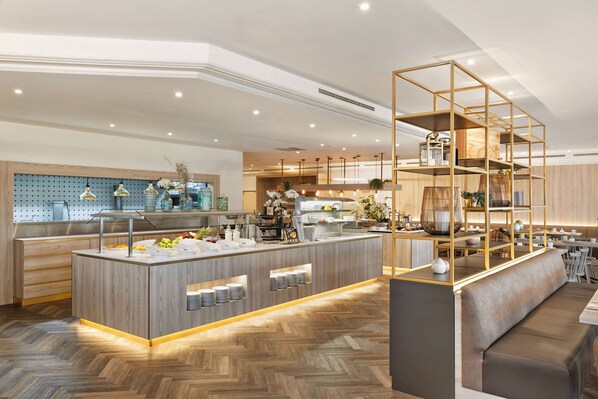 Breakfast, lunch served; international cuisine, al fresco dining 