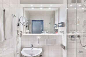 Shower, free toiletries, hair dryer, towels