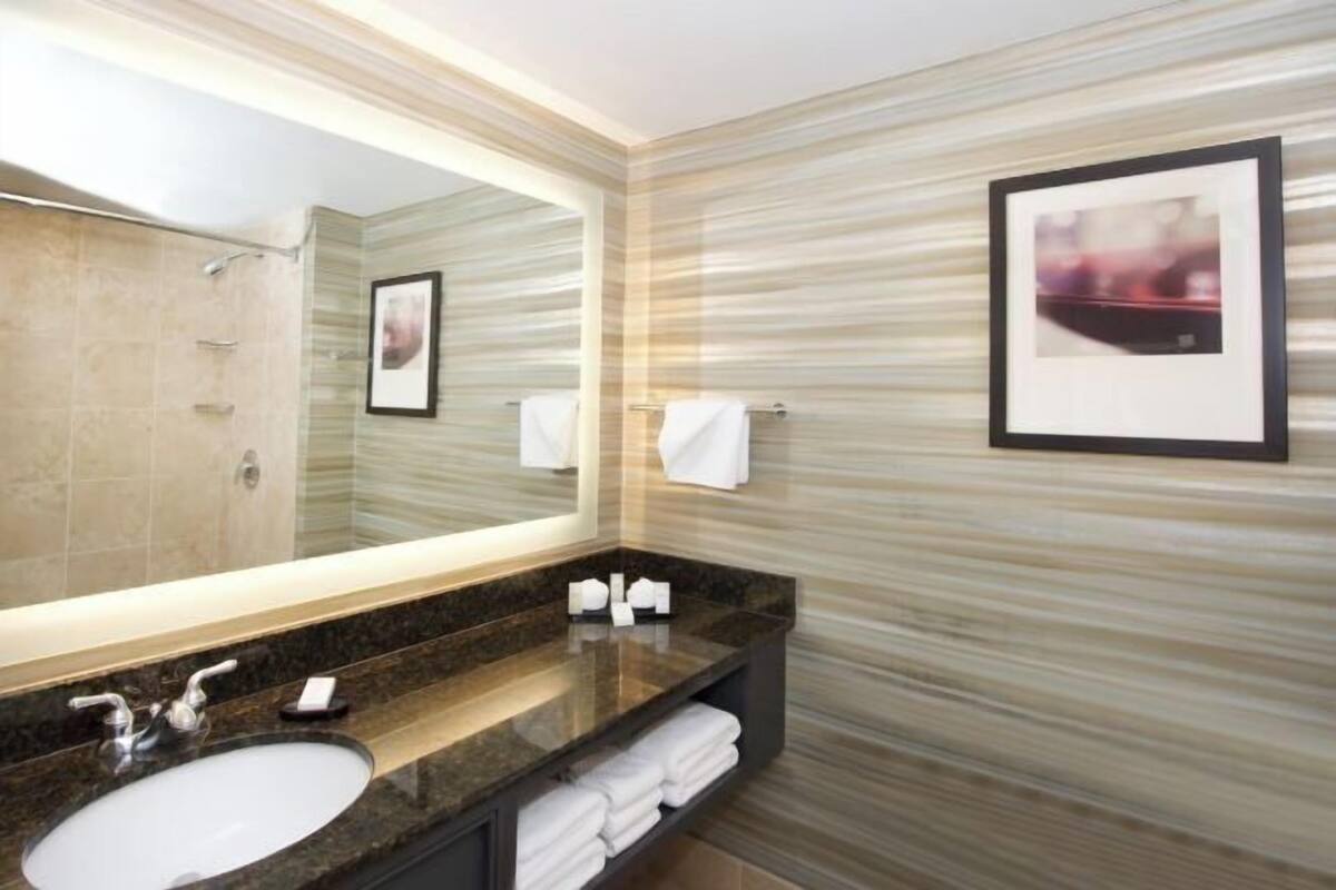 Designer toiletries, hair dryer, towels, soap