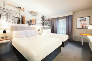 A hotel room with a large bed, a desk, and a cityscape mural on the wall. - Leonardo Hotel Belfast (Belfast)