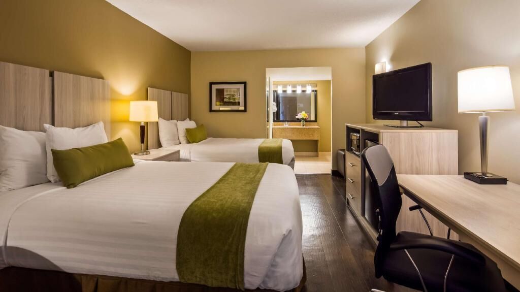 Hypo-allergenic bedding, pillowtop beds, in-room safe, desk