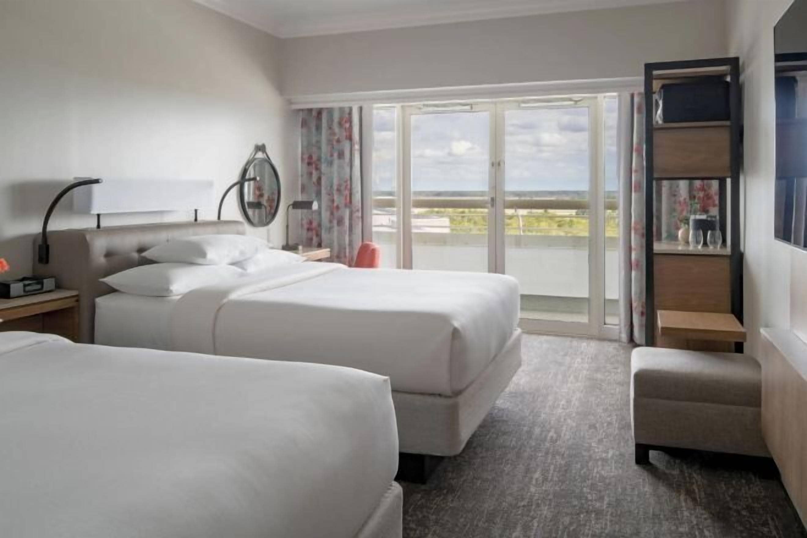 Premium bedding, down comforters, pillowtop beds, in-room safe