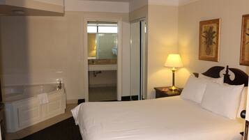 Suite, 1 Queen Bed, Non Smoking | Desk, iron/ironing board, cots/infant beds, rollaway beds