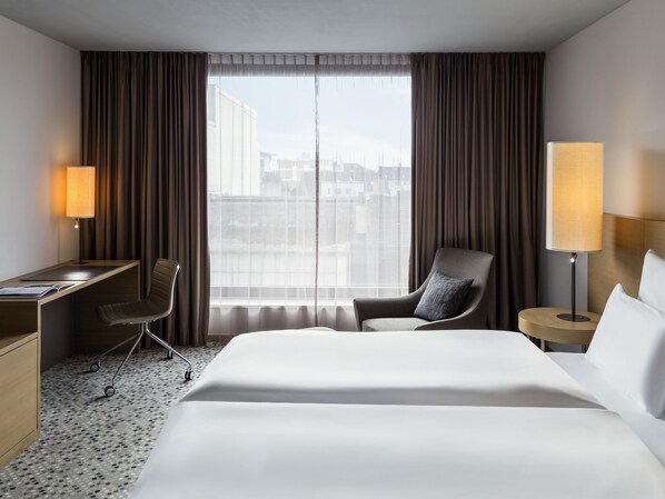 Classic Room | Premium bedding, minibar, in-room safe, desk - Pullman Basel Europe (Basel)